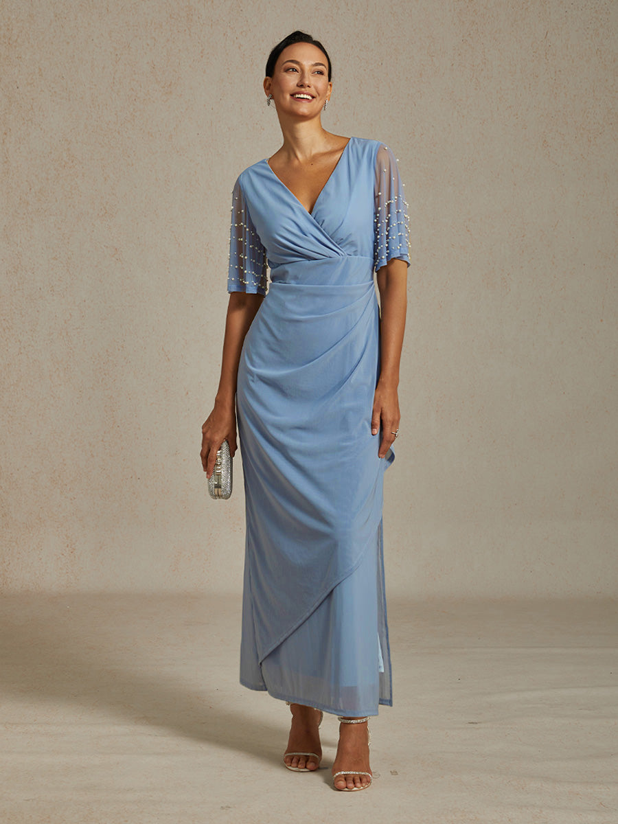 Robe de soirée élégante avec manches volantées ornées