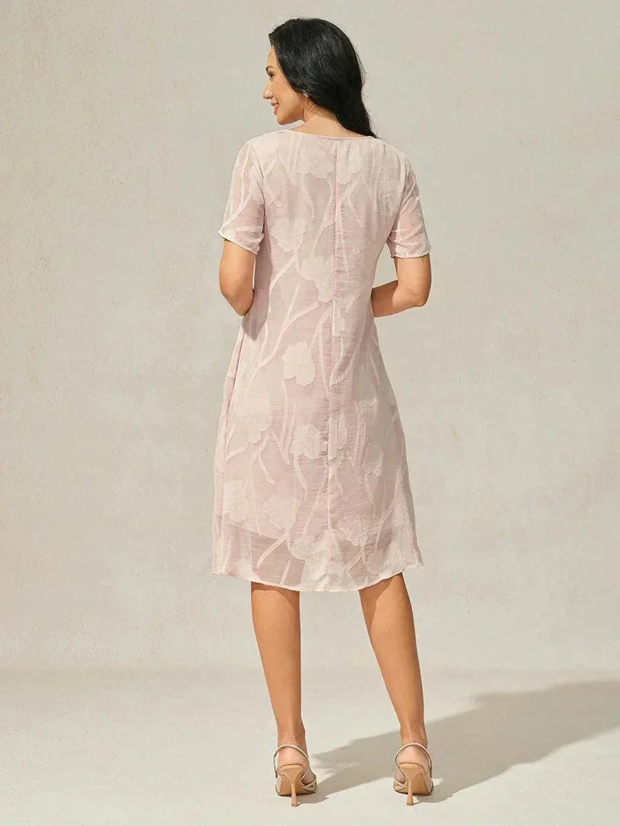 Blumenbesetztes, transparentes Chiffonkleid in Knielänge und A-Linie