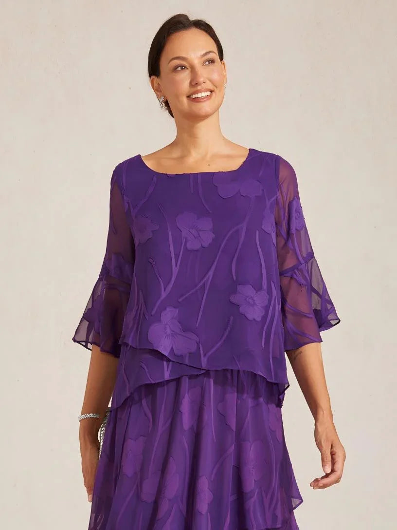 Elegante Chiffonbluse mit asymmetrischem Saum
