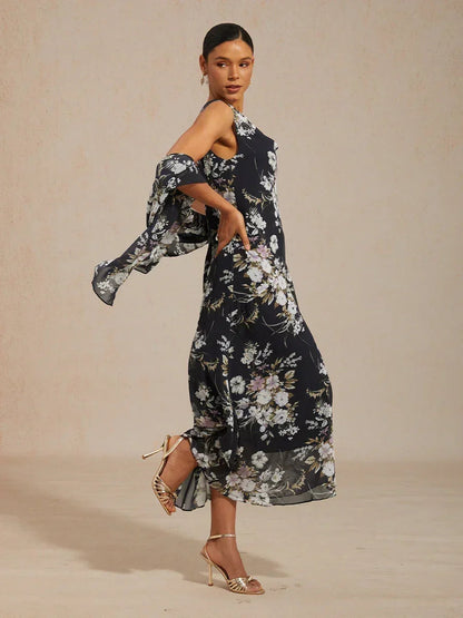 Robe longue à col bénitier et ourlet à volants