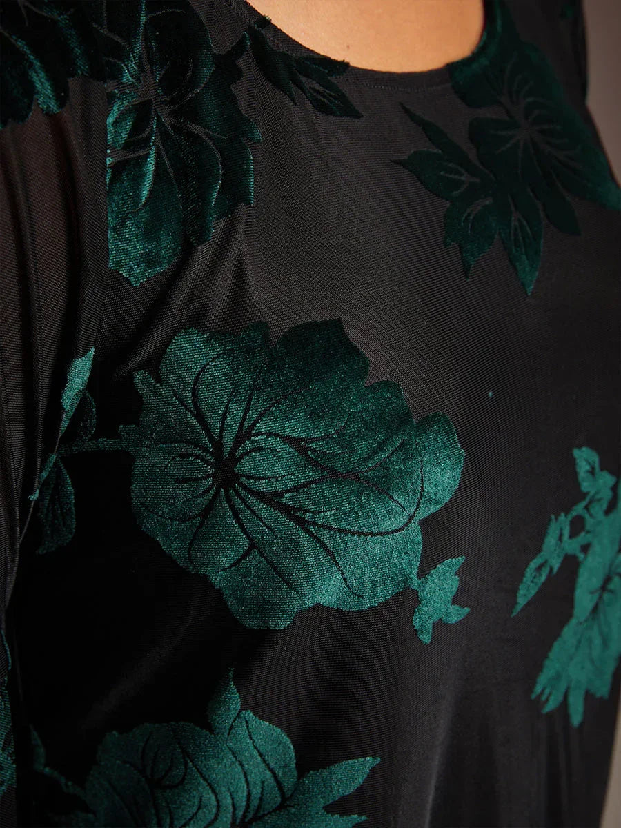 Elegante, florale Samtbluse mit asymmetrischem Saum