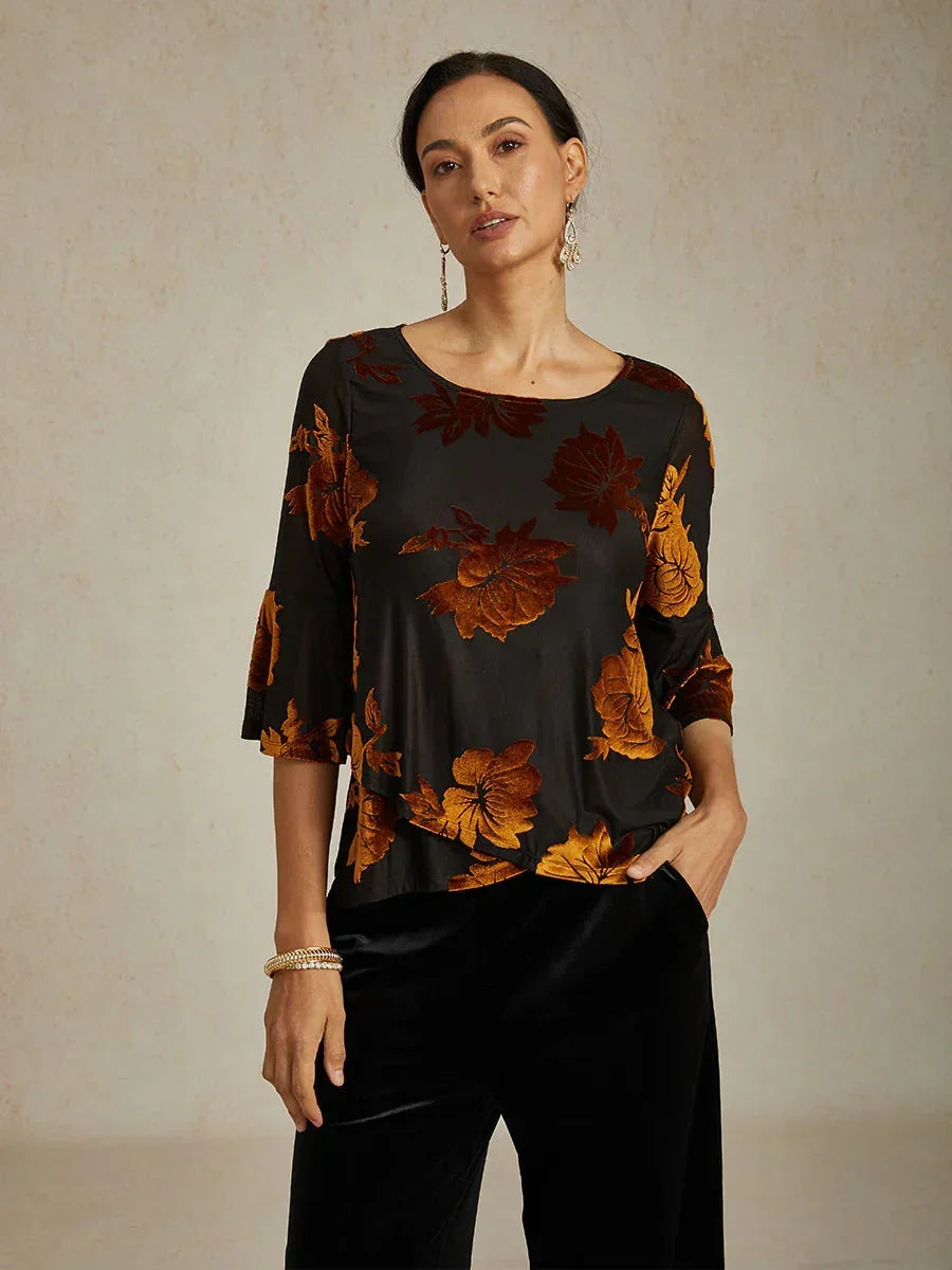 Elegante, florale Samtbluse mit asymmetrischem Saum