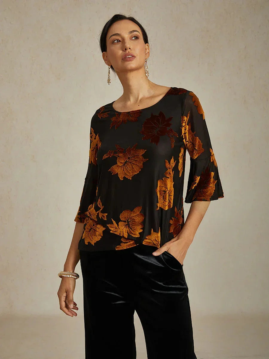 Elegante, florale Samtbluse mit asymmetrischem Saum