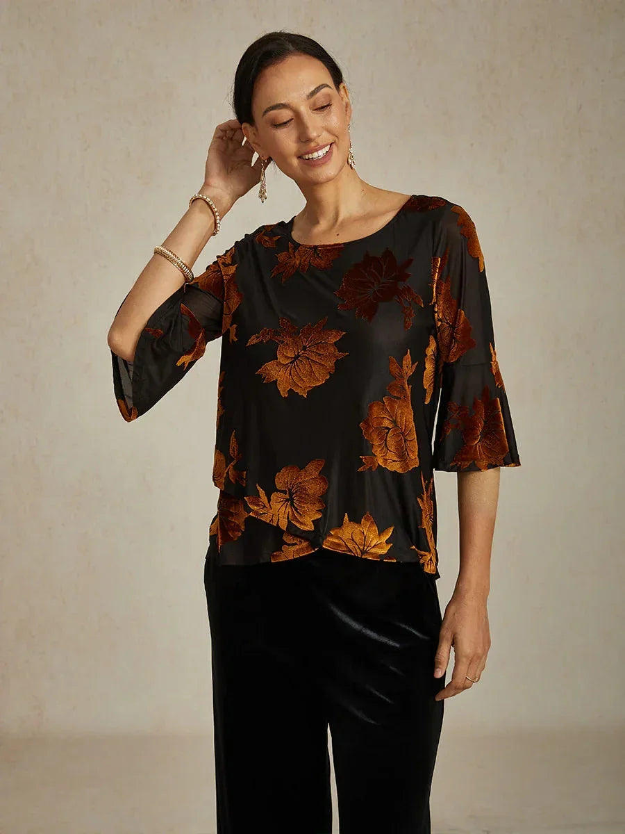 Elegante, florale Samtbluse mit asymmetrischem Saum
