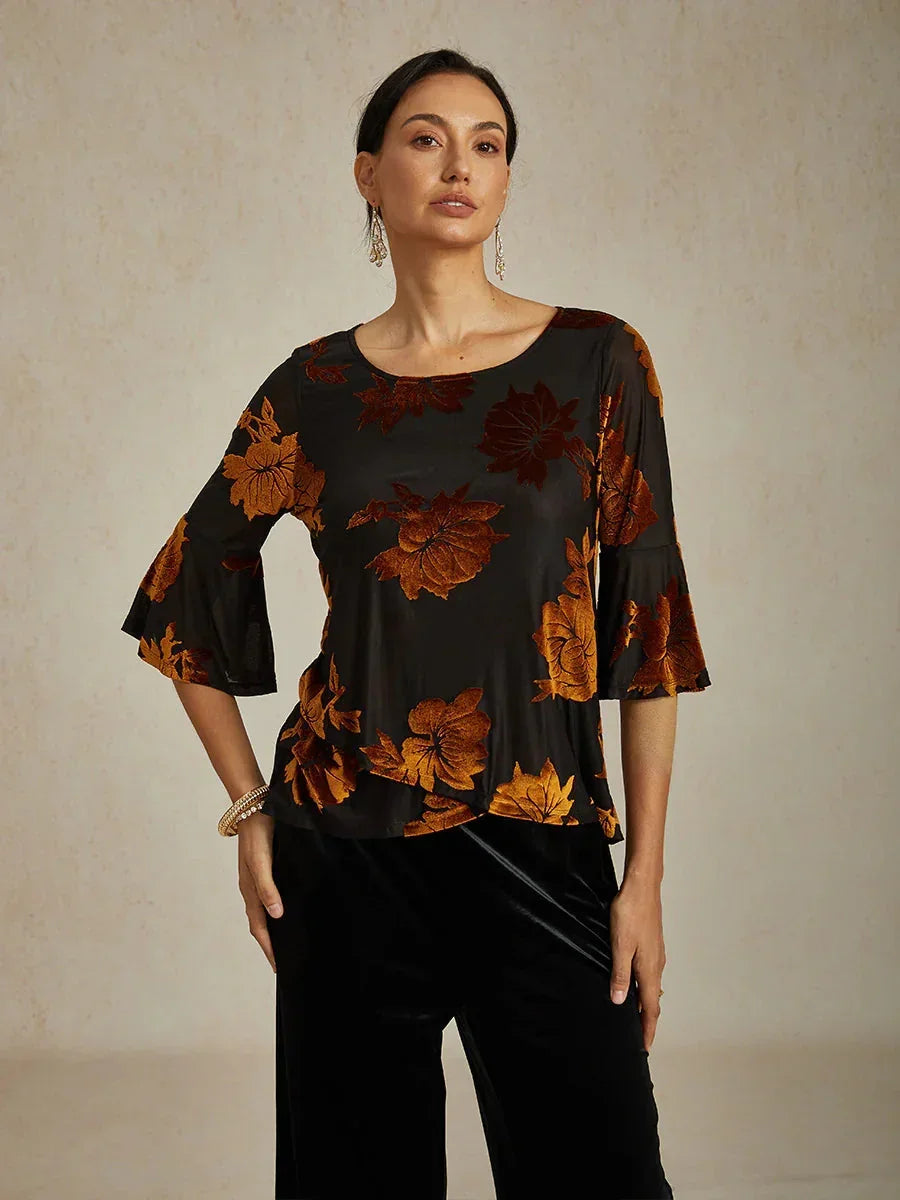 Elegante, florale Samtbluse mit asymmetrischem Saum