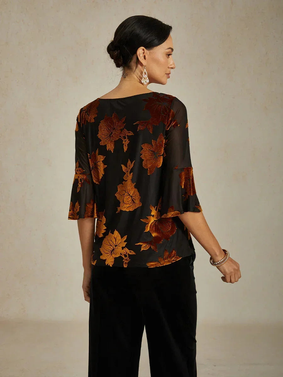 Elegante, florale Samtbluse mit asymmetrischem Saum