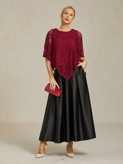 Elegantes Spitzentop mit Fledermausärmeln