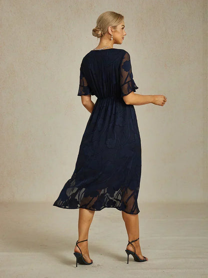 Maxikleid mit Rüschen und flatternder Spitze