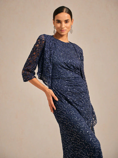 Veste en dentelle extensible à paillettes et manches 3/4