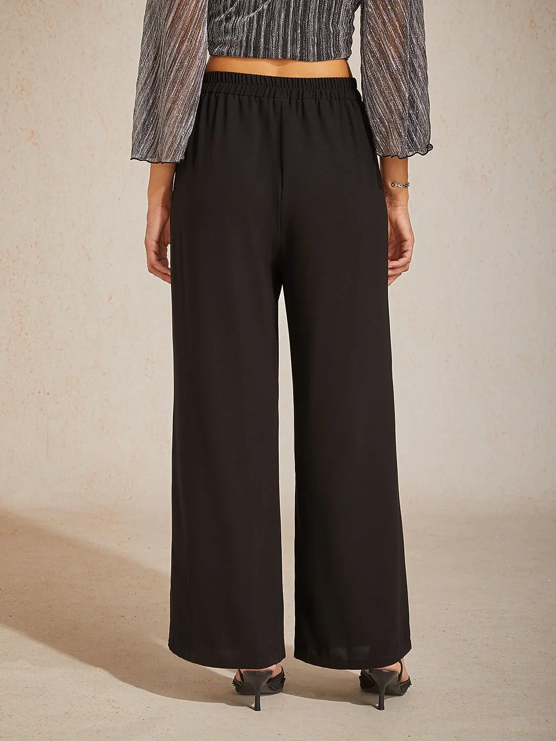 Weite Hose mit mittelhohem Bund und Taschen