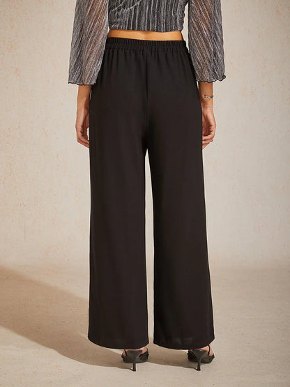 Weite Hose mit mittelhohem Bund und Taschen