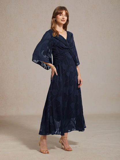 Robe longue en mousseline à volants, torsadée, à motif floral en dentelle