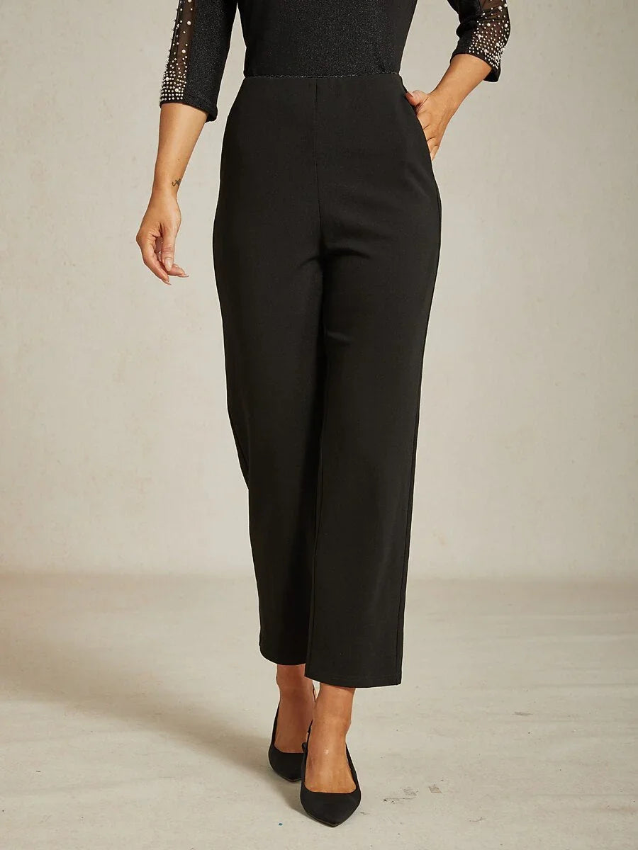 Schwarze, schmal geschnittene Hose mit elastischem Bund und Seitentaschen
